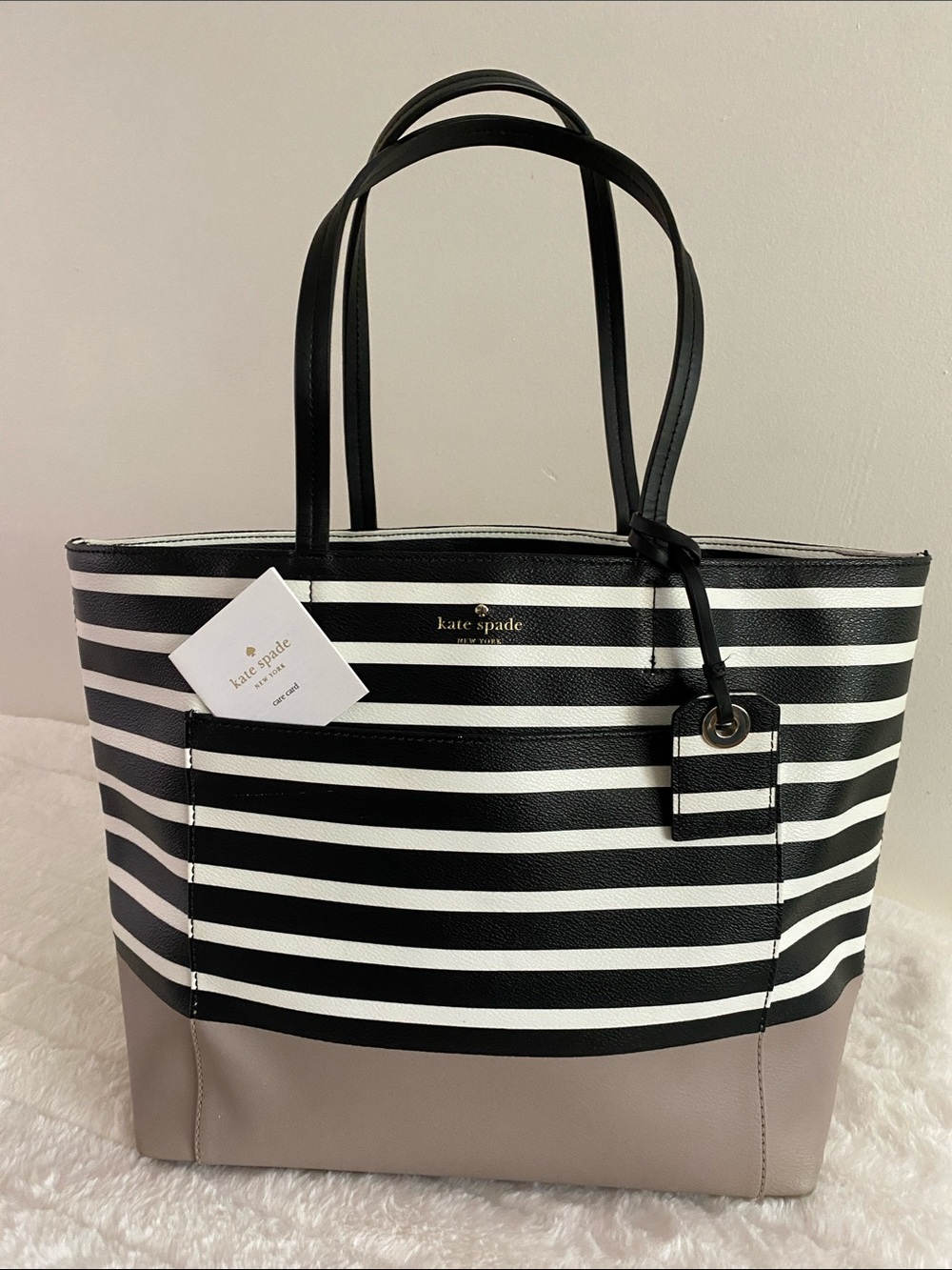 Kate Spade New York Hyde Lane Dipped Small Riley Tote in Black, White, and Taupe